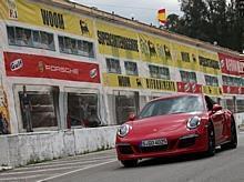 Porsche GTS Experience Targa Florio Revival 2015: 911 GTS Coupé vor der alten Boxengasse in Cerda  Foto:Auto-Medienportal.Net/Porsche